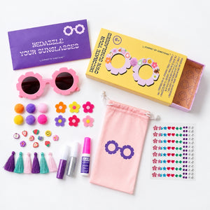 Decorate Your Own Sunglasses kit with flower glasses, charms, tassels, pompoms and gem stickers