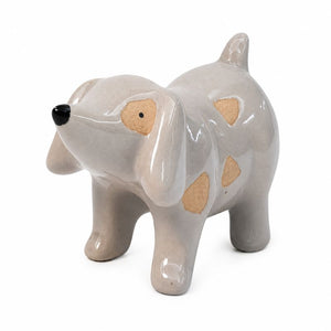 A glossy ceramic dog figurine in a light gray glaze with tan patches and a small black nose, photographed on a plain white background.-Dog Pot Hanger Bisque - 6cm