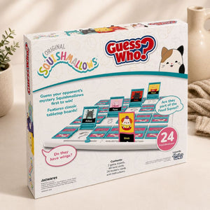 Guess Who? Squishmallows board game box by Jazwares, featuring colorful character cards and a game board design on a light beige tabletop with soft background props.