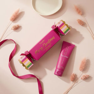 Huxter Hand Balm Bon Bon gift with 50ml hand balm in a styled blush flat lay