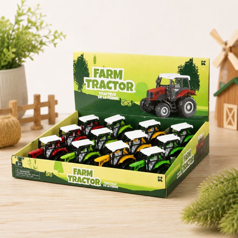 Box of toy farm tractors on a wooden surface with decorative elements.- Loveshack Giftware