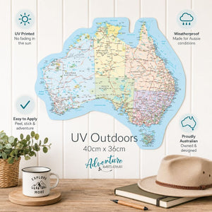 Map of Australia on a wooden surface with a mug, notebook, and hat. - Loveshack Giftware