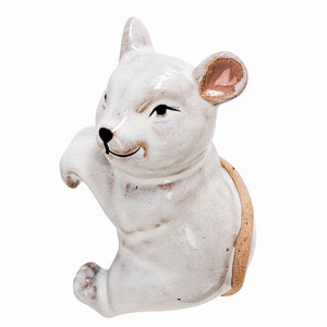 A ceramic wall-mounted animal figurine shaped like a white mouse or rat with a glossy finish, black painted facial features, and a textured tan back, shown against a plain white background.-Mouse Pot Hanger White 9cm