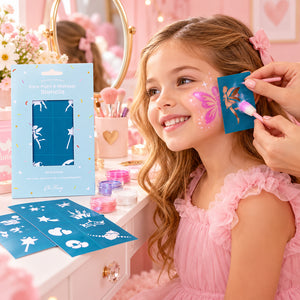 Child enjoying face painting with Oh Flossy reusable makeup stencils