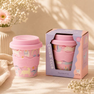 Pink Unicorn Babychino Cup, 4 oz, with lid and packaging on a neutral background