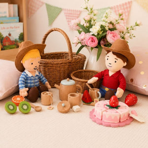 Ruby Farmer Cuddle Doll plush toy with red shirt, blue jeans, brown boots, and soft felt farmer hat on white background