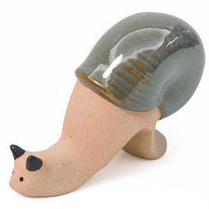 A ceramic snail figurine with a speckled beige body and a glossy, dark gray-green shell accented with subtle gold glaze details, set against a plain white background.-Snail Pot Hanger Green 8cm