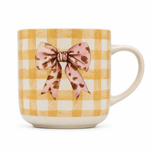 A Splosh-Saddle & Bloom Bow Mug on the front, set against a plain white background.