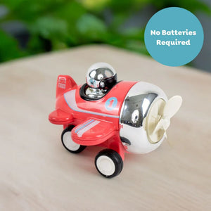 Child playing with Tiger Tribe Presto Plane push toy no batteries required