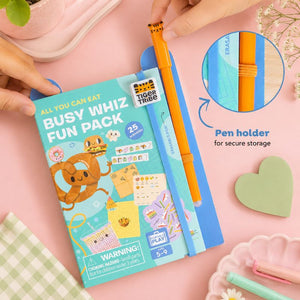 Busy Whiz Fun Pack with a pen and eraser on a pink background