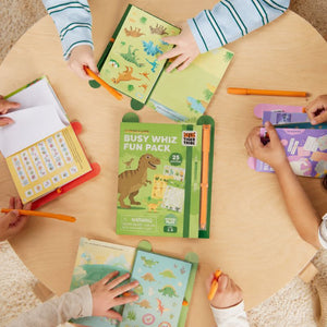 Children playing with Busy Whiz Fun Pack educational toys on a table.