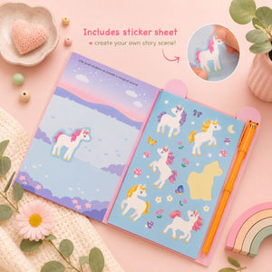 Colorful Busy Whiz unicorn-themed notebook with stickers and a pen on a pink background—Loveshack Giftware