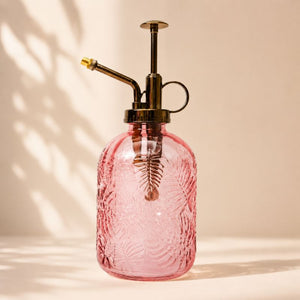 Pink glass spray bottle with brass nozzle on a beige background-Loveshack GIftware