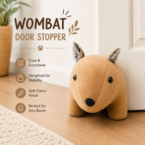 Wombat-shaped door stopper on a wooden floor with product features listed.