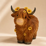 Highland Cow with sunflowers on a beige background