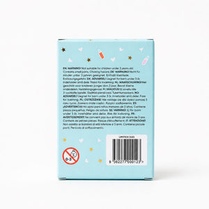 The back of aOh Flossy Better Together Lipstick box shown against a white background, featuring warning text, a barcode, a red circle-and-hand icon, and small decorative star and heart illustrations.