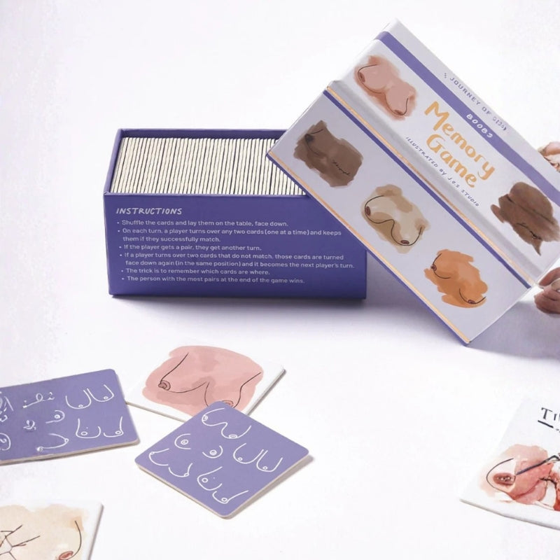 Open Journey of Something Boobs Memory game with cards displayed beside the box