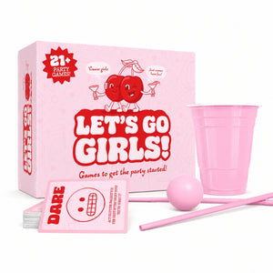 Pink party game set including a box labeled 'LET'S GO GIRLS!', a pink cup, a pink ball, pink straws, and cards on a white background.