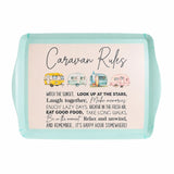 A Caravan Bamboo Melamine Serving Tray with rounded corners, featuring a mint aqua border and a cream center printed with the title 'Caravan Rules' and a list of camping-themed rules. Small watercolor campers appear across the top, and the sign is photographed on a plain white background.