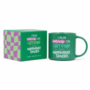 A Cheeky Caffeine Mug with the text 'I RUN entirely ON CAFFEINE AND INAPPROPRIATE THOUGHTS' in white, pink, and light green lettering, shown next to its matching green gift box with a purple and green checkered pattern on a white background.