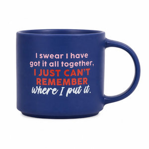 A Cheeky Remember Mug with a handle, featuring a humorous quote printed on the side in white and orange text, set against a plain white background.