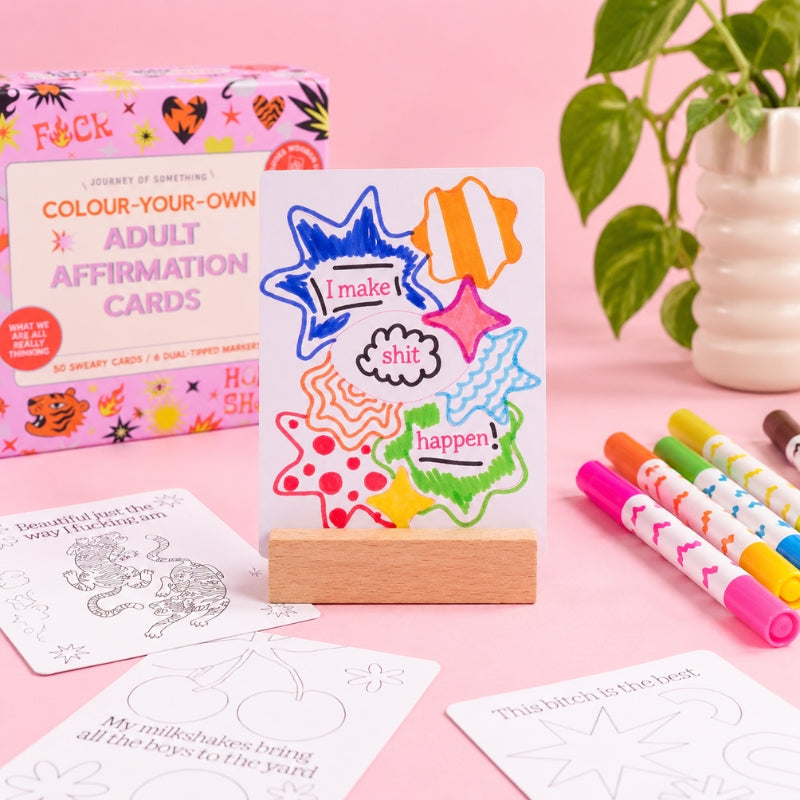Finished adult affirmation card displayed in the included wooden stand with markers and product box