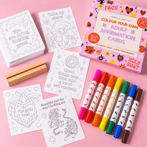 Adult colouring a Journey of Something affirmation card with dual-tipped markers
