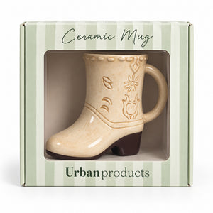 Tan ceramic cowboy boot mug in original Urban Products gift box.