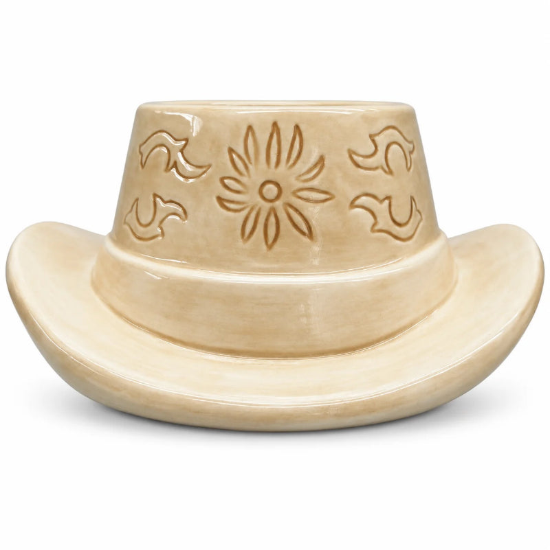Tan ceramic cowboy hat planter with embossed Western floral design