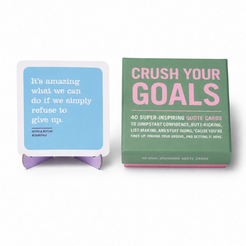 Pack of motivational quote cards Crush Your Goals Inner-Truth Deck with a quote card displayed on a stand.