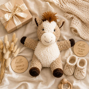Curly Horse Soft Toy Brown 18cm flat lay with baby shower gifts and nursery accessories, plush horse toy by Love Shack Giftware