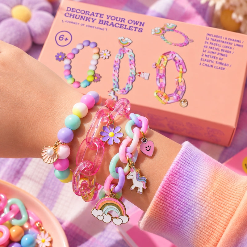 Child wearing handmade chunky bracelets with pastel beads, charms and rainbow details