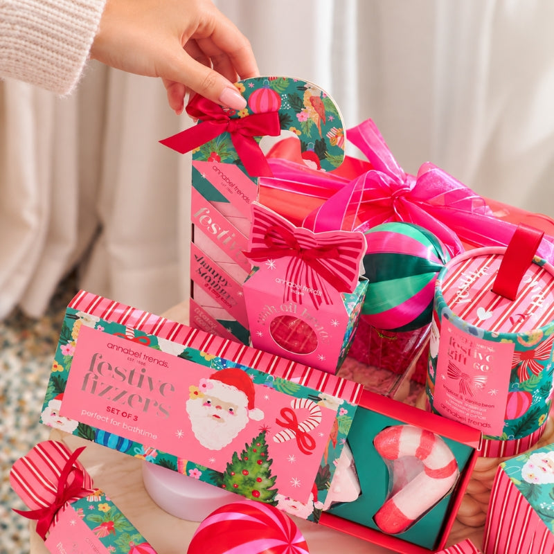 Annabel Trends festive bath gift collection with colourful Christmas packaging and ribbons