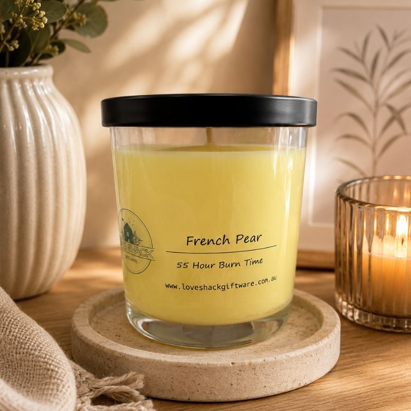 Love Shack Giftware French Pear Soy Candle in a reusable glass jar with approximately 55 hours burn time and sweet fruity fragrance.