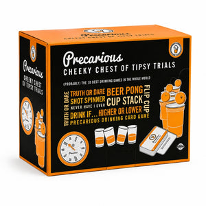 Precarious Cheeky Chest of Tipsy Trials game box, featuring a black and orange color scheme with illustrations of drinking games and cups.