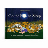 Hardcover children's book titled "Go the Fuck to Sleep" by Adam Mansbach, illustrated by Ricardo Cortés. The cover shows a dark blue night sky with a bright moon and an illustration of several sleeping orange-and-black striped cats on green grass, with a small child sleeping beside them.