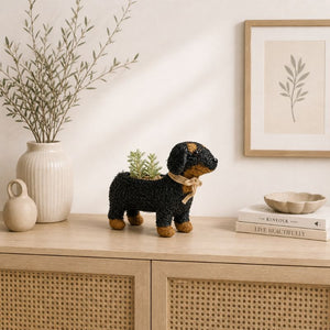 Cute dog planter styled on minimalist shelf with neutral decor