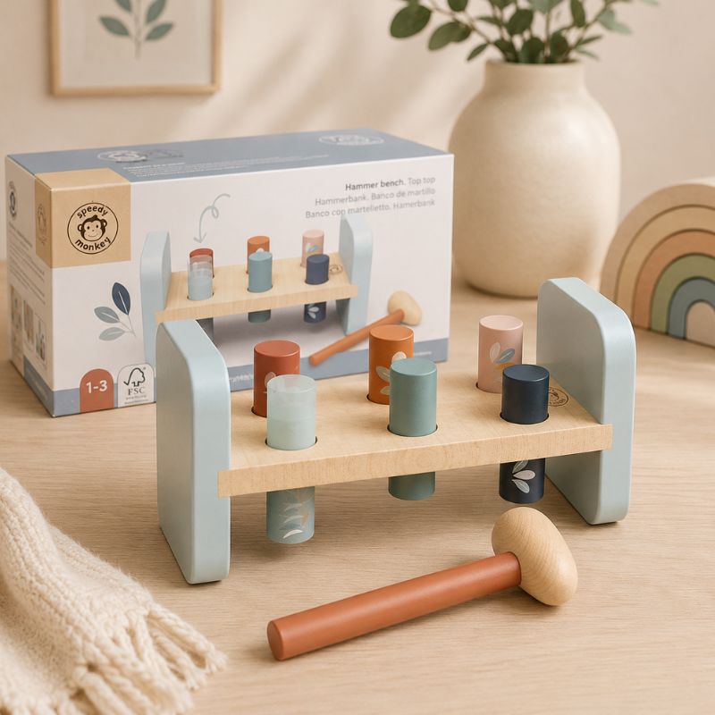 Hammer bench Wooden toy set with cups and a hammer on a table, featuring a packaging box in the background. - Loveshack Giftware
