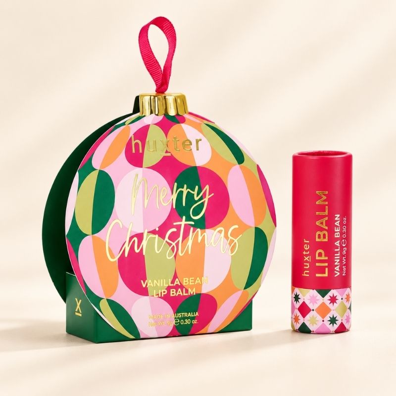 Huxter Vanilla Bean lip balm with colourful bauble gift packaging