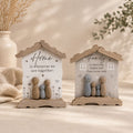 Home and Family house-shaped hanging plaques with pebble family figurines on a soft beige background, rustic farmhouse wall decor.