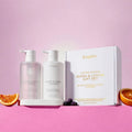 Huxter wash and lotion gift set on a pink background