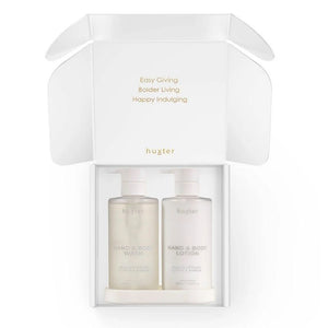 Two bottles of Huxter hand and body wash and lotion in a white box with 'Huxter' branding.