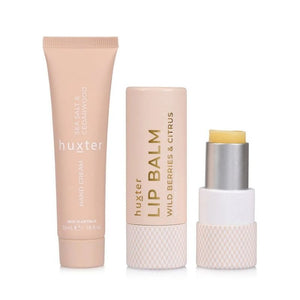 Three Huxter skincare products on a white background