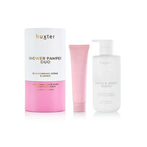Huxter shower pamper duo with body wash and scrub on a white background