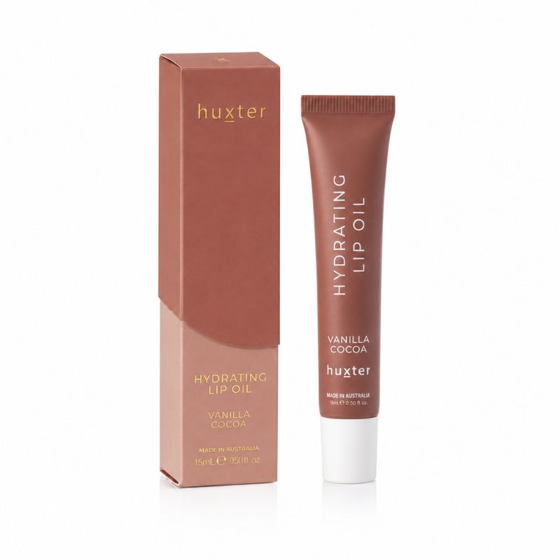 Huxter Hydrating Lip Oil Vanilla Cocoa 15ml with matching retail box on white background