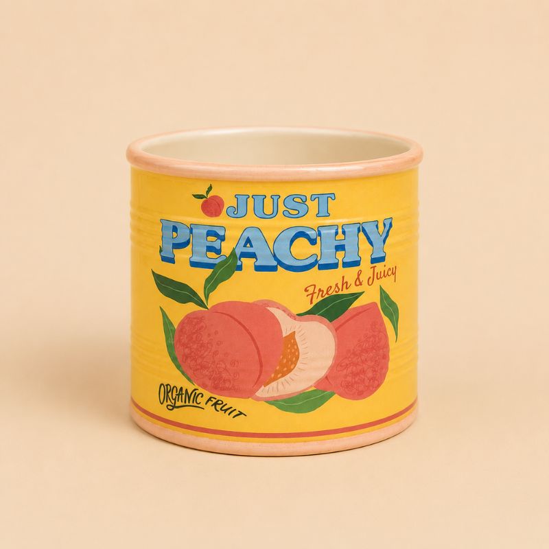 Ceramic jar with 'Just Peachy' label on a beige background