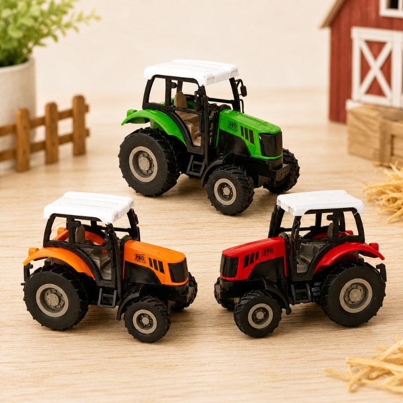 Three toy tractors in light green, yellow, and dark green on a wooden surface with a small barn model in the background. - Loveshack Giftware