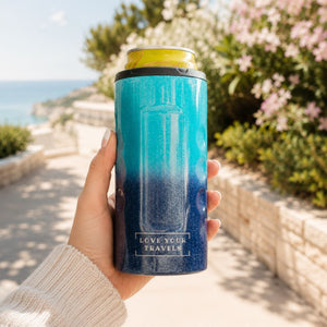 Hand holding a blue and yellow thermos with 'Love Your Travels' text, outdoors.-Loveshack Giftware