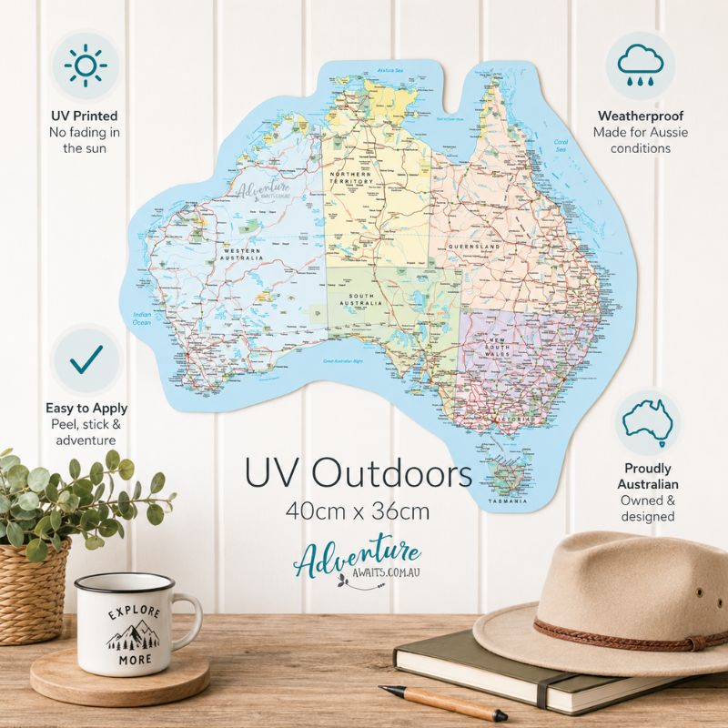 Map of Australia on a wooden surface with a mug, notebook, and hat. - Loveshack Giftware