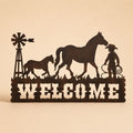 Western horse and cowboy welcome metal wall art sign on a light beige background with soft shadow, farmhouse entryway décor.